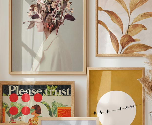 Bright room with several framed prints on the wall